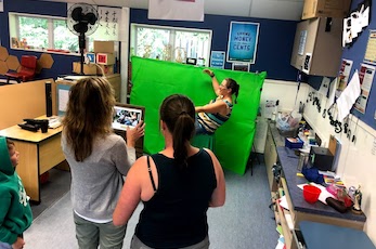 Teachers Taking Photos In Makerspace